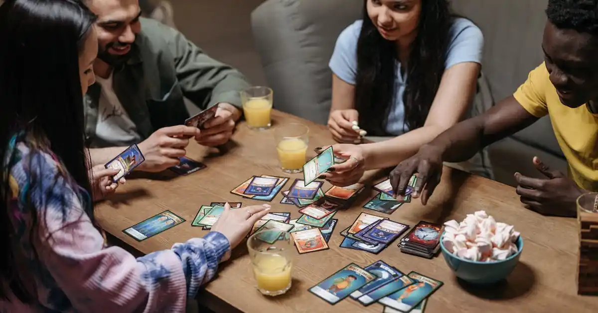 Magic: The Gathering cards fanned out showing rares and a dual land