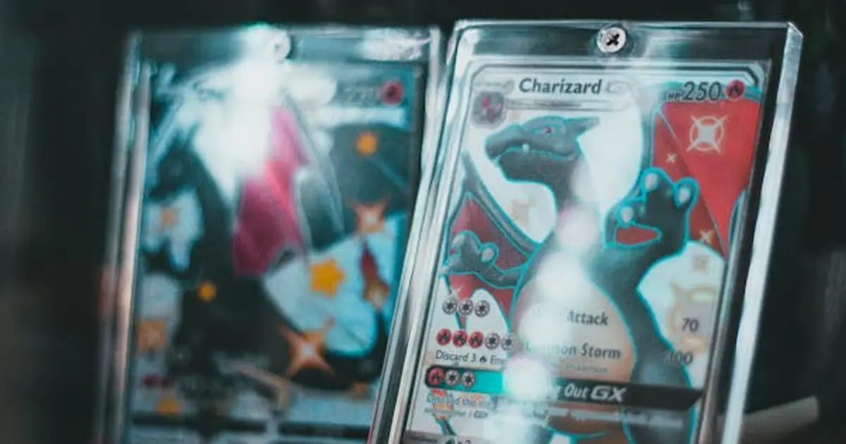 Close-up of Pokemon cards in protective cases